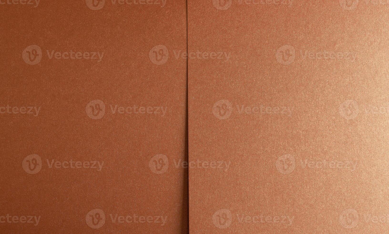 Copper texture close-up. Folded material with metallic surface, abstract pattern, and decorative photo