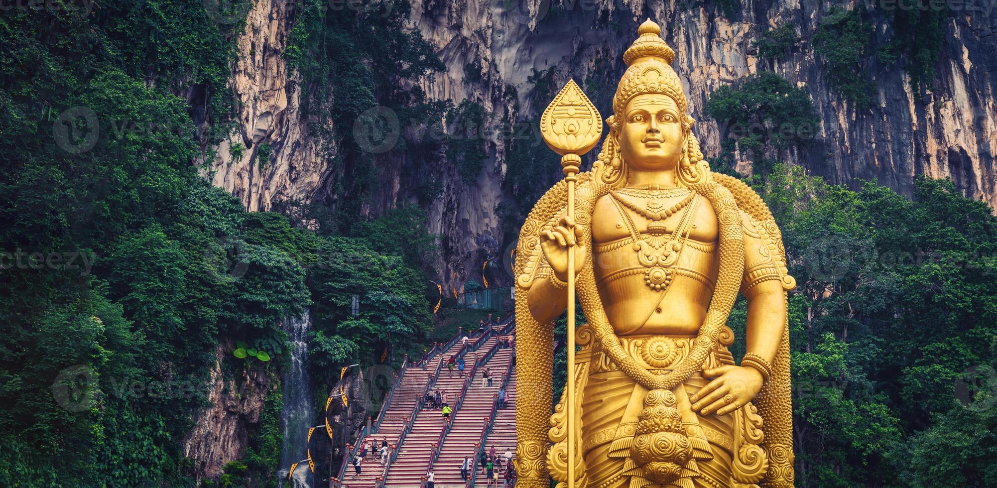 Statue of Lord Muragan and entrance at Batu Caves in Kuala Lumpur, Malaysia. photo