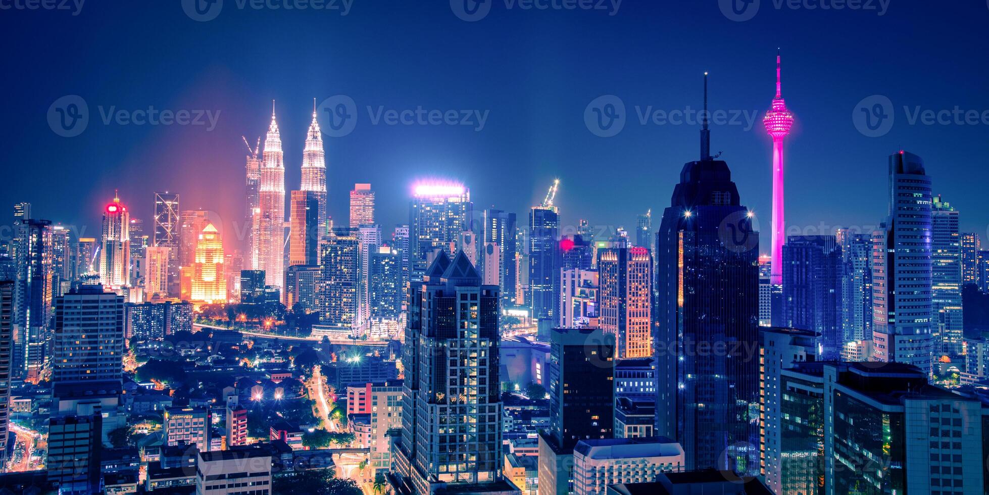 Cityscape of Kuala lumpur city skyline at night in Malaysia. photo