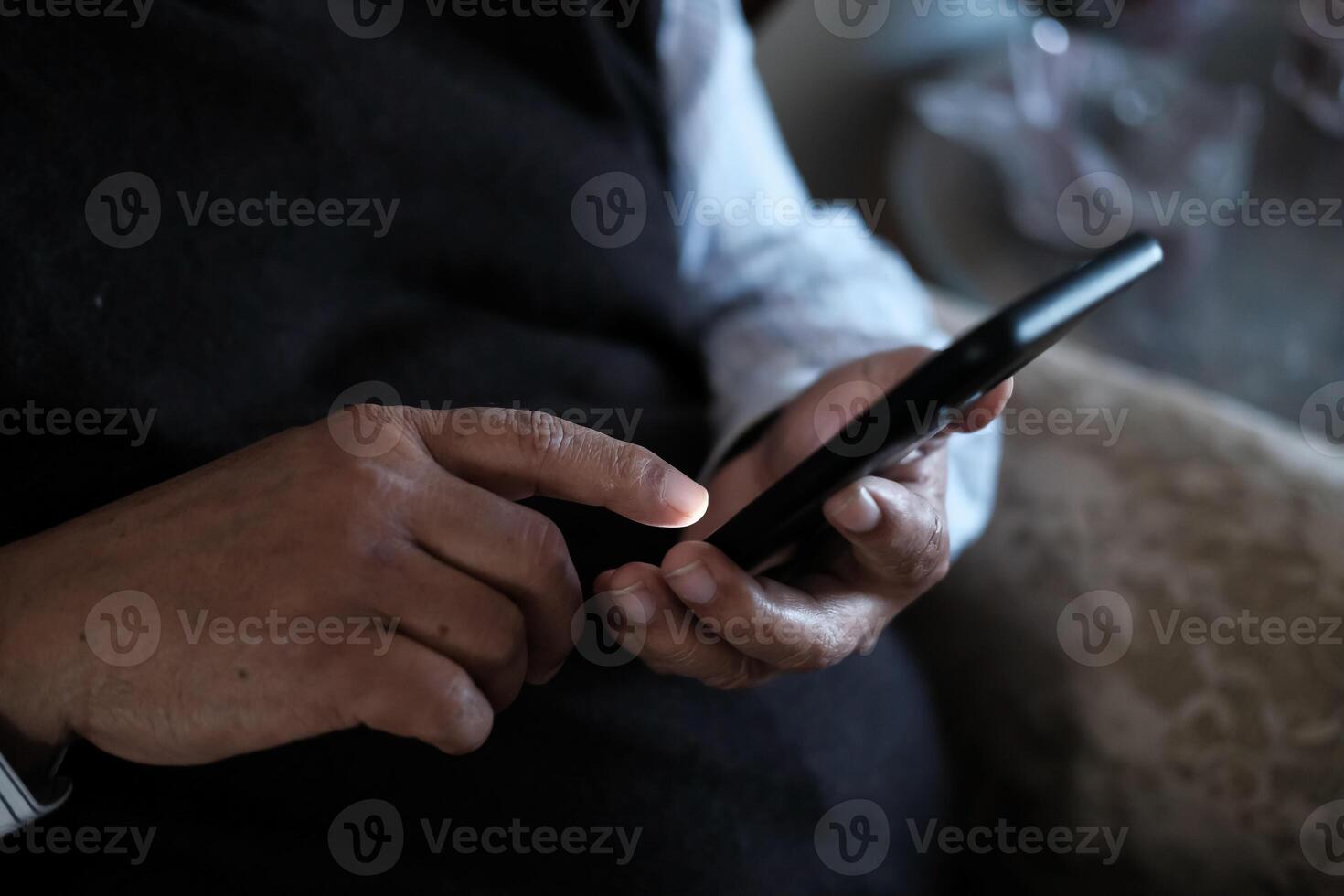 A person is actively using a smartphone for various forms of communication and activities photo