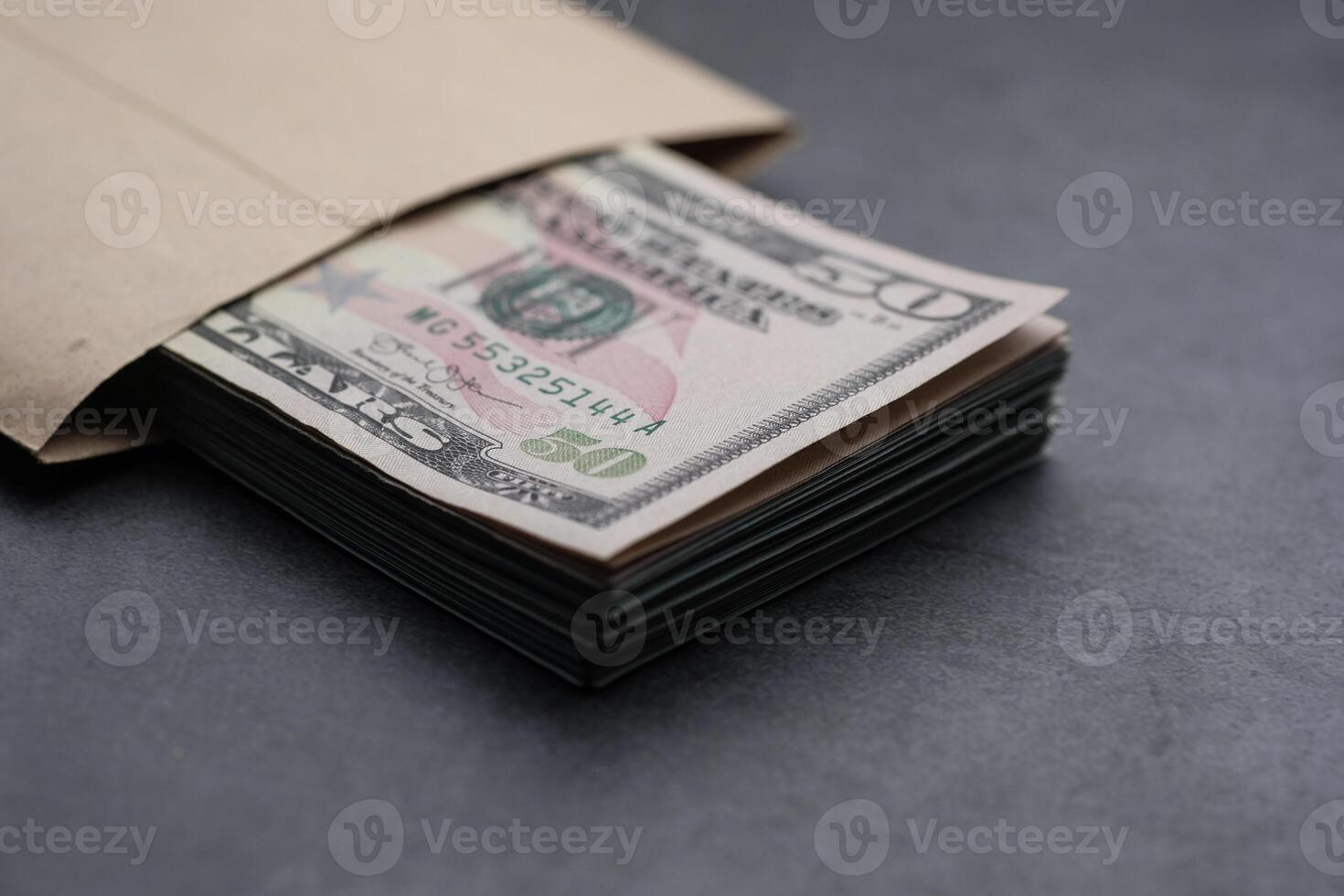 Cash in an Envelope Neatly Stacked Dollars Prepared for Secure Financial Transactions photo