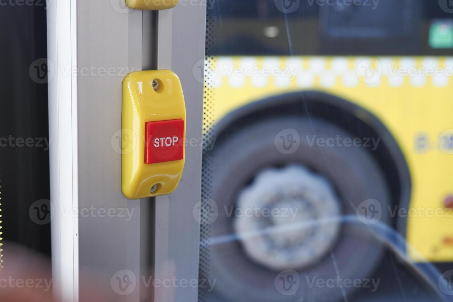 Closeup of Bus bell switch for stop inside the public bus photo
