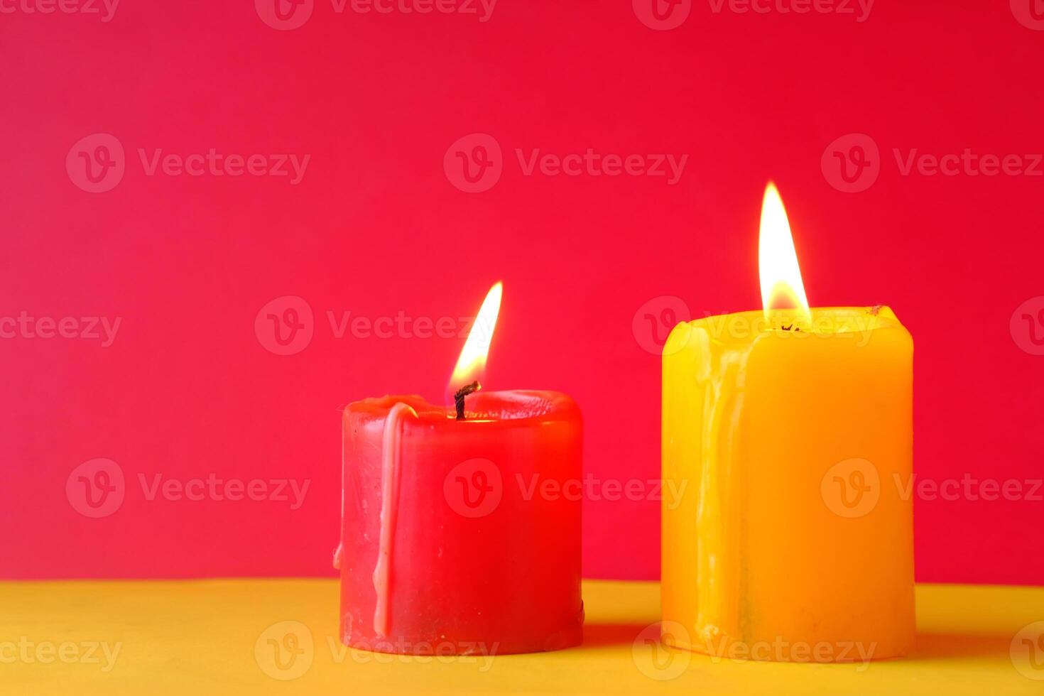Vibrant and Beautiful Candles Set Against a Colorful and EyeCatching Background photo