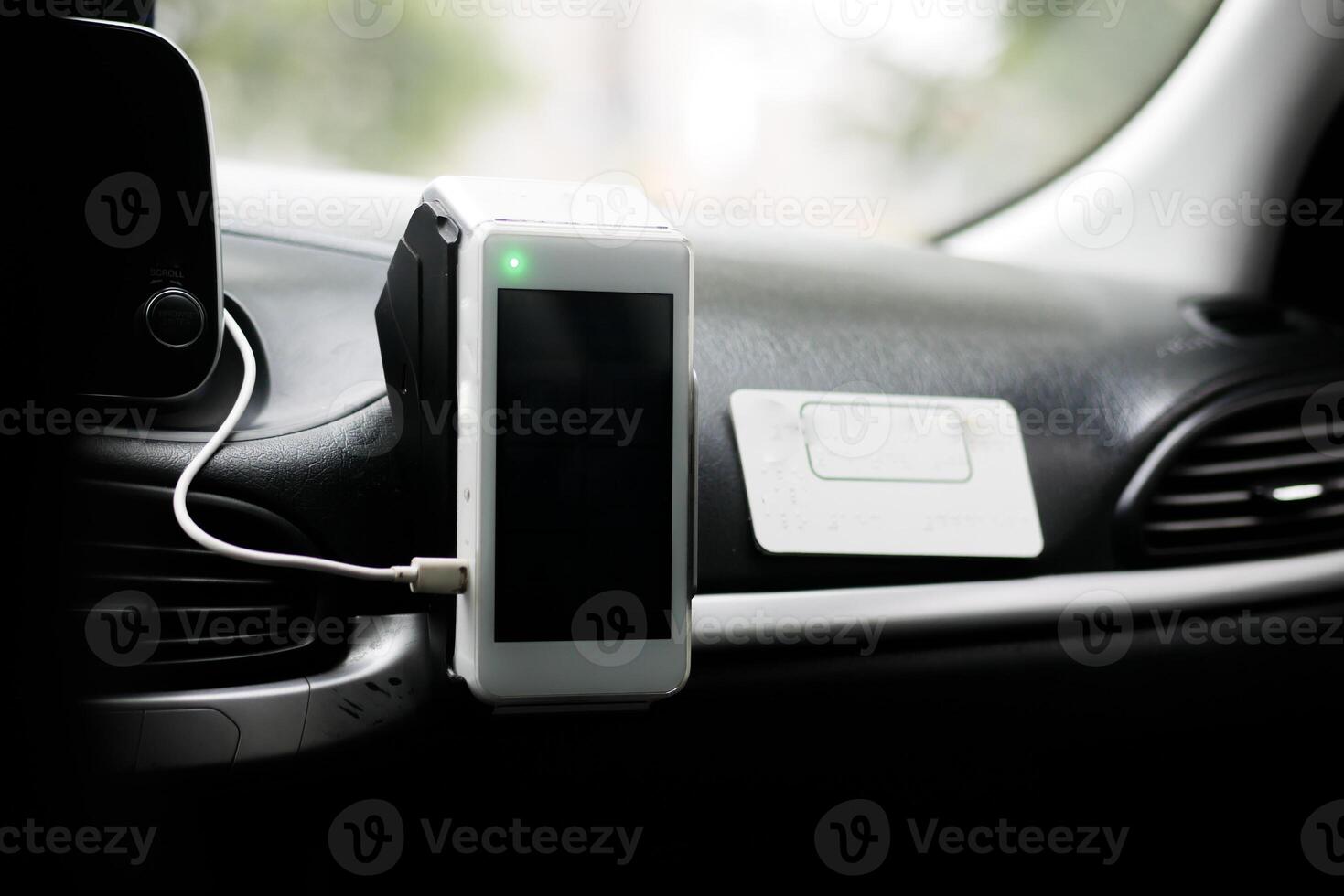 POS machine on yellow taxi photo