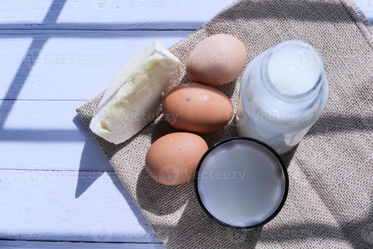 Fresh Ingredients for Baking Eggs, Butter, Plus Coconut Milk for Delicious Recipes photo