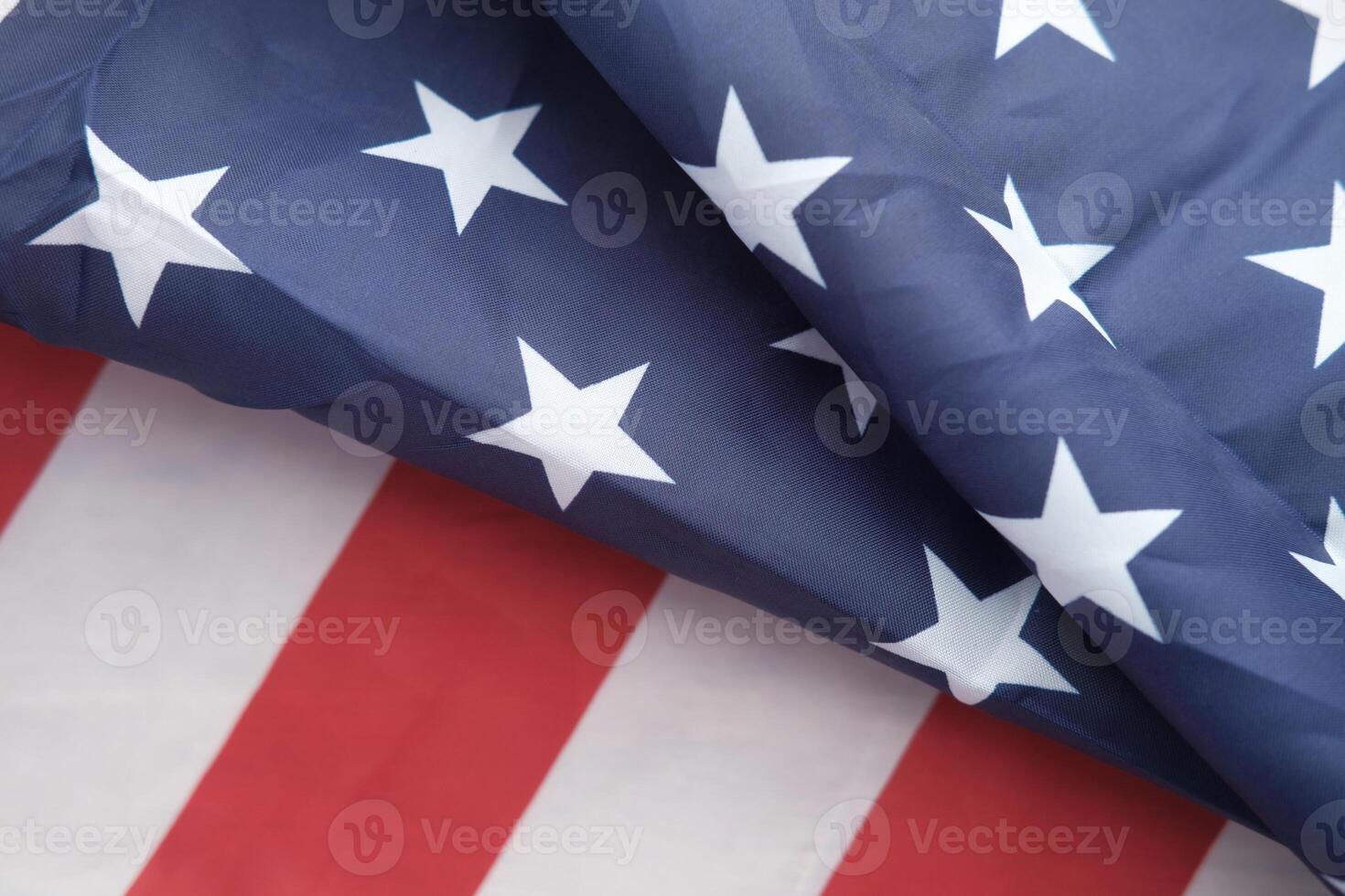 A Beautiful CloseUp of the American Flag, Featuring the Iconic Stars and Stripes Pattern photo