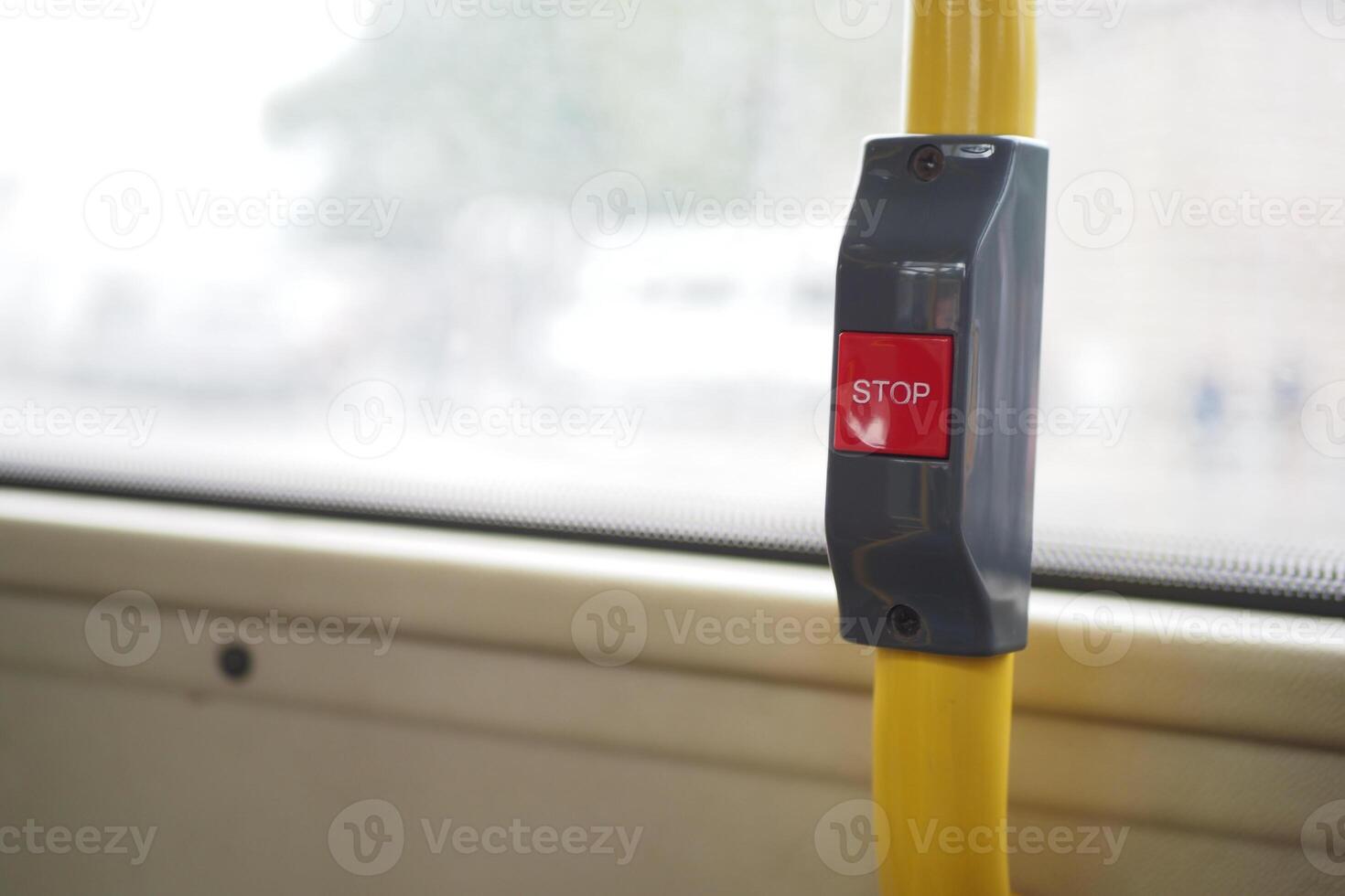 A close up of a stop sign on a bus photo