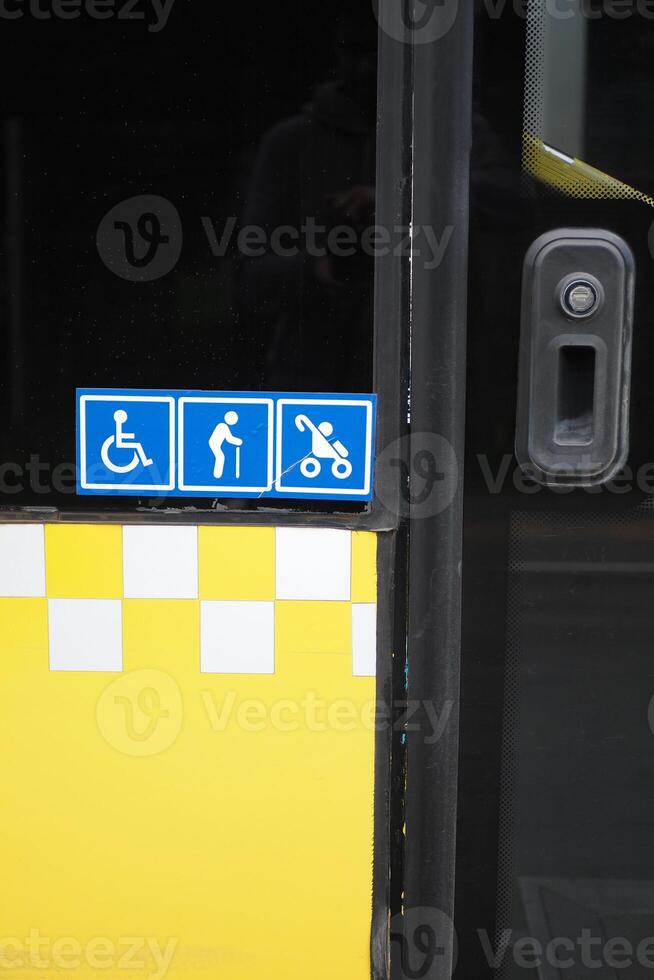 Enhancing accessibility with yellow checkerboard symbols for public transportation icon display photo