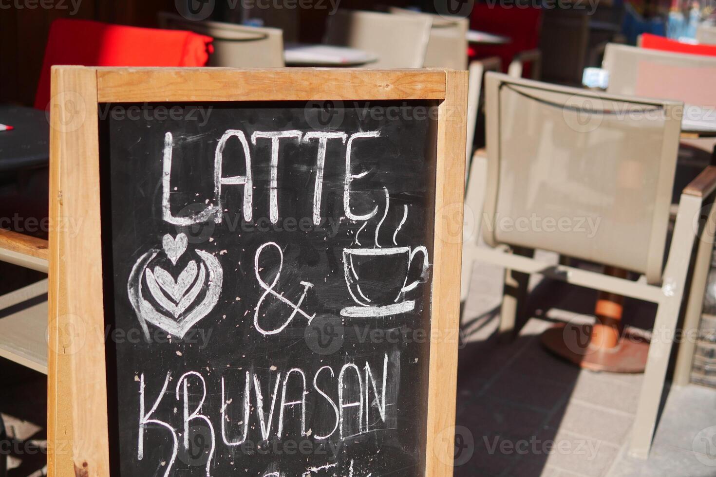 Cafe menu on black board outdoor photo