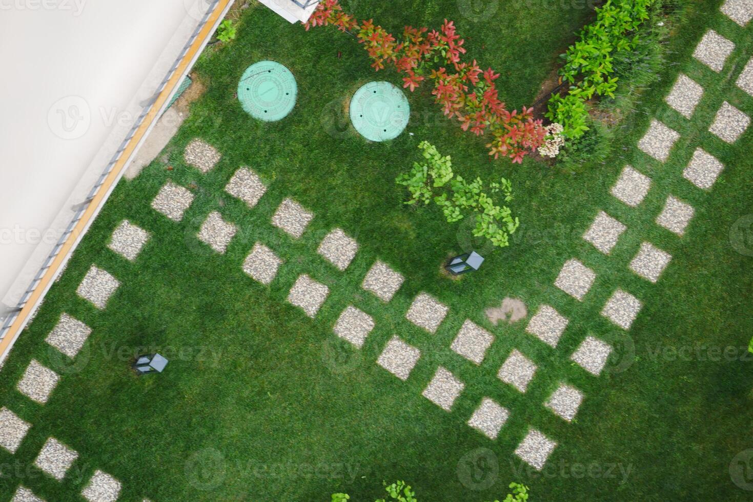 An Aerial View of a Beautifully Landscaped Garden Complete with Picturesque Pathways photo