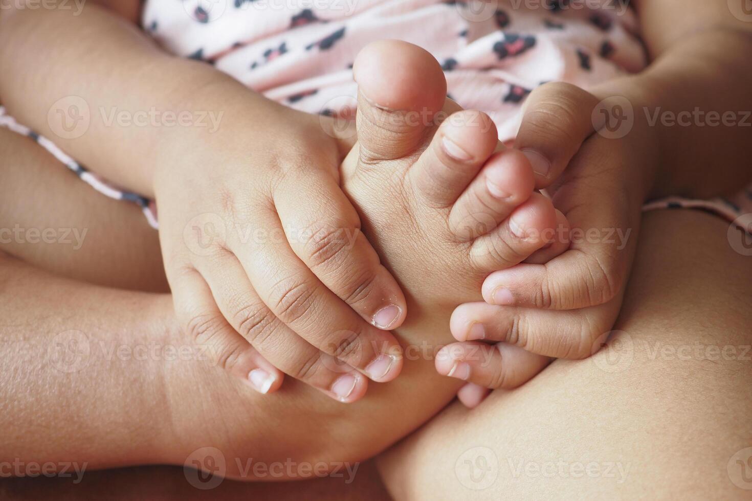 6 year old child suffering pain on feet photo