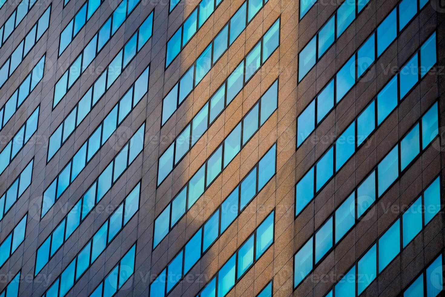 Architectural Design with a Blue Glass Facade That Captivates Attention and Imagination photo