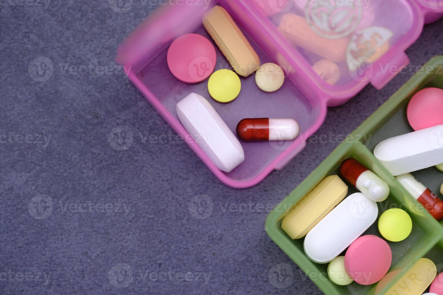 A Colorful Pill Organizer Featuring Various Medications Displayed in an Organized Manner photo