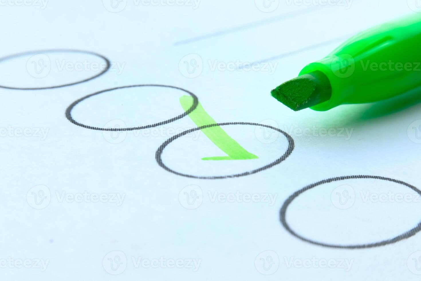 Highlighting an Important Checklist with a Green Marker on a Piece of Paper for Clarity photo