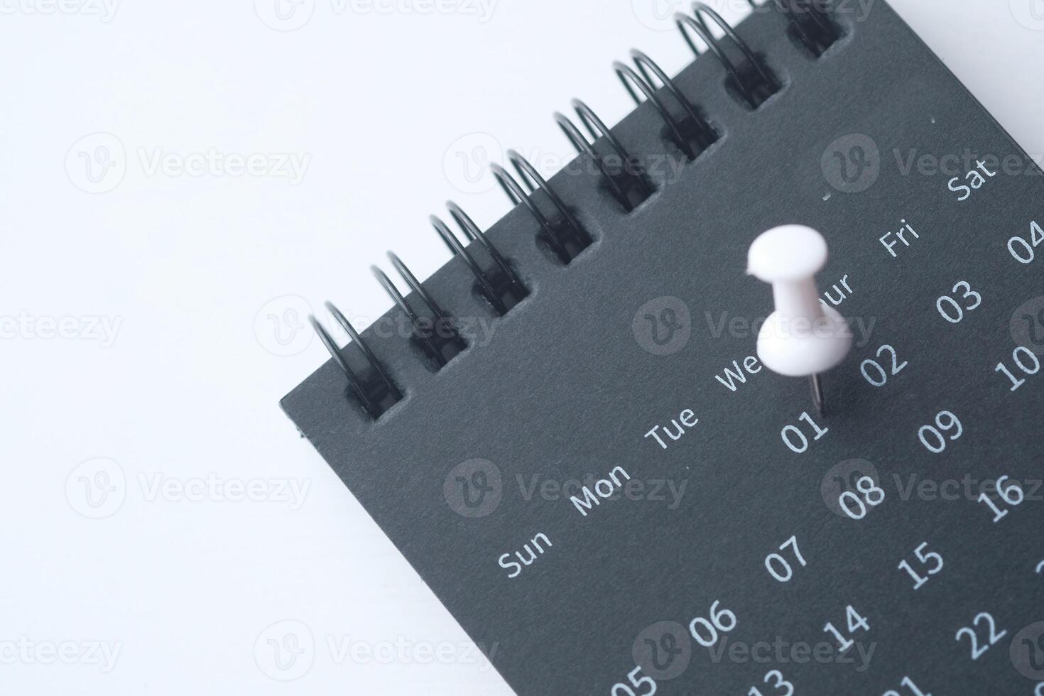 Sleek and Minimalistic Desk Calendar with Pin Feature for Enhanced Organization and Planning photo