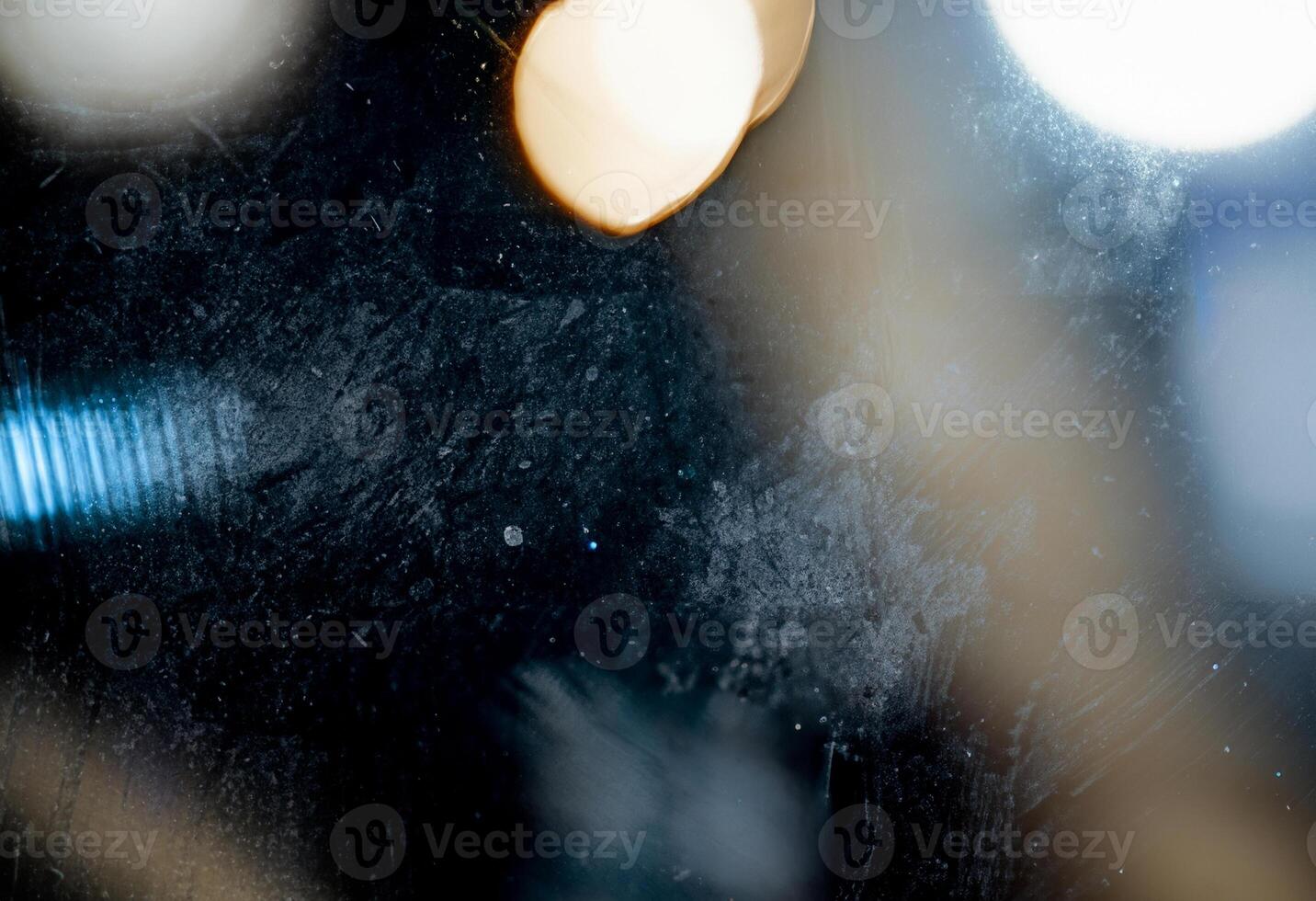 Close-up abstract texture with frosted surface, soft light streaks, and subtle rainbow reflection. photo