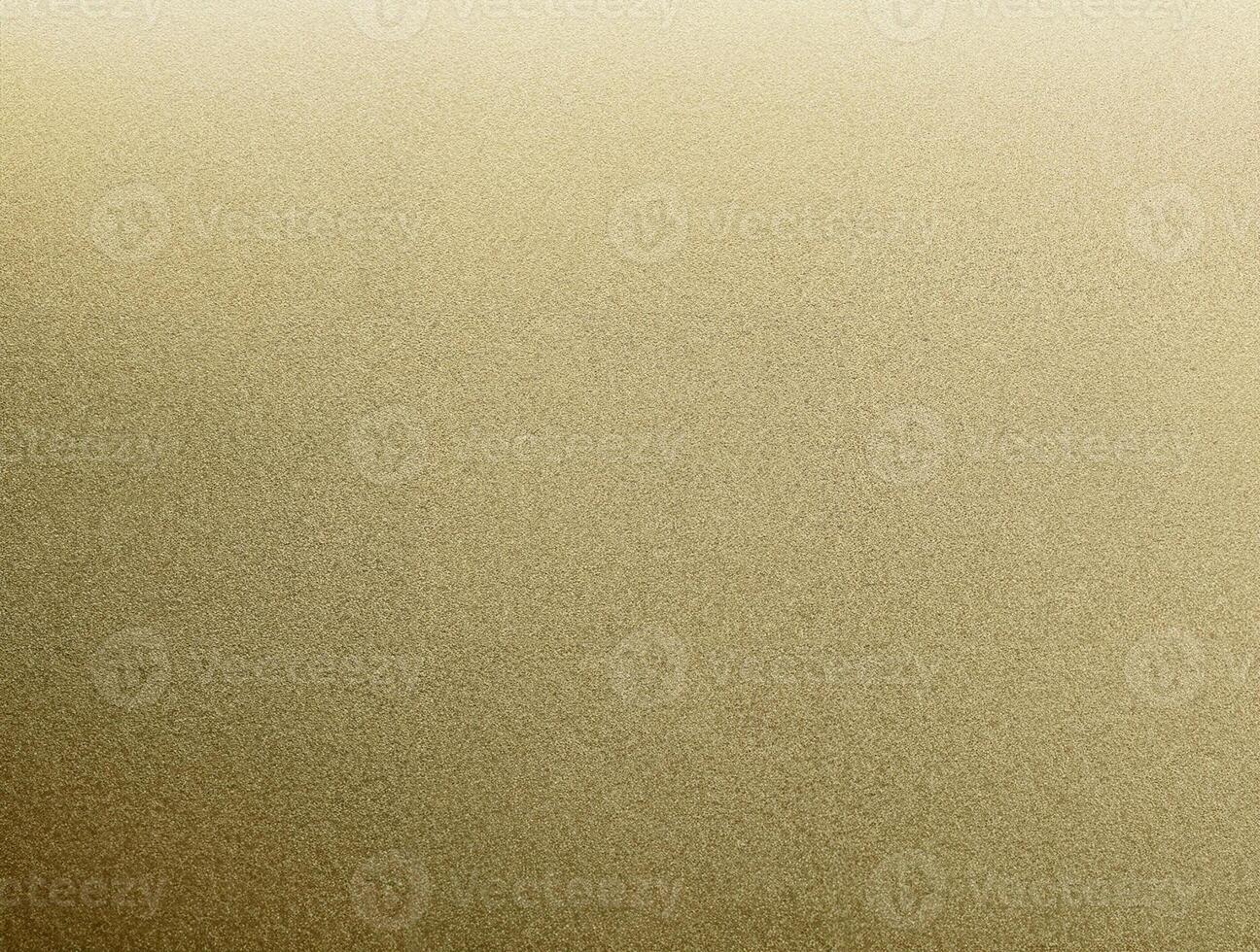 Close-up of golden sandpaper texture with a fine, grainy surface, perfect for backgrounds and design elements. photo