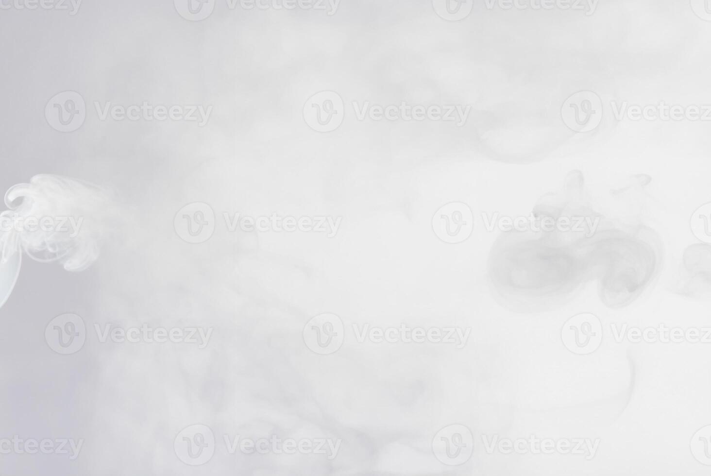 Soft white smoke or mist floating on a light background, perfect for abstract, atmospheric, or ethereal designs. photo