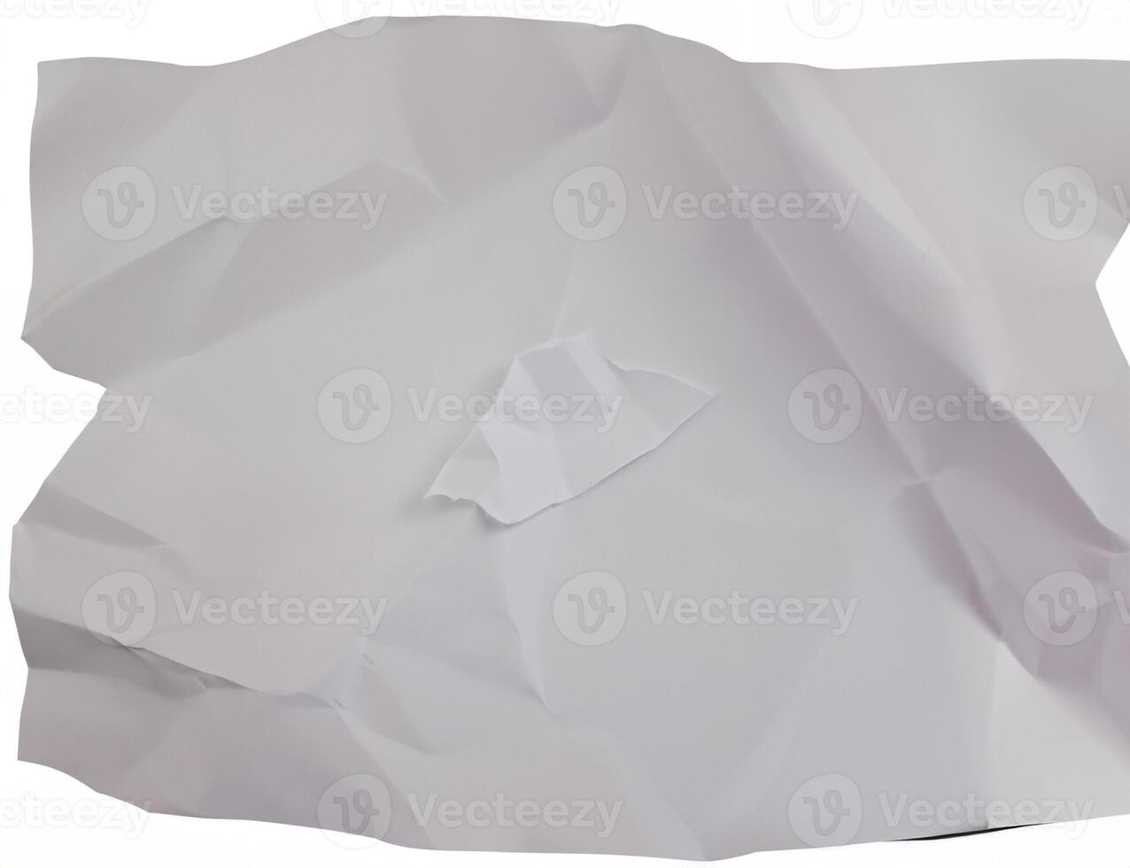 A crumpled sheet of white paper with deep folds and wrinkles, isolated on a plain white background. photo