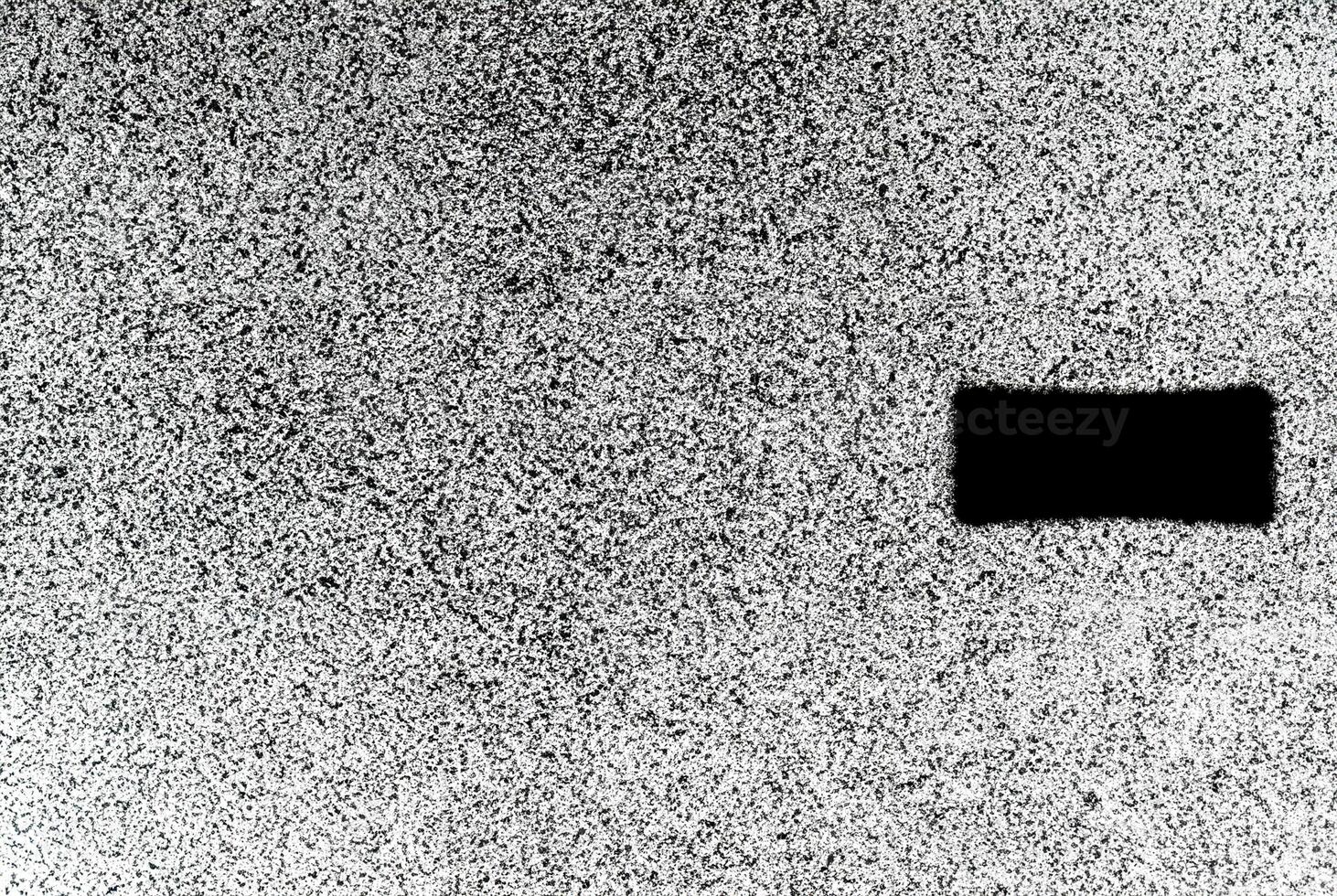 High-contrast black and white noise texture background, ideal for abstract design and graphic use. photo