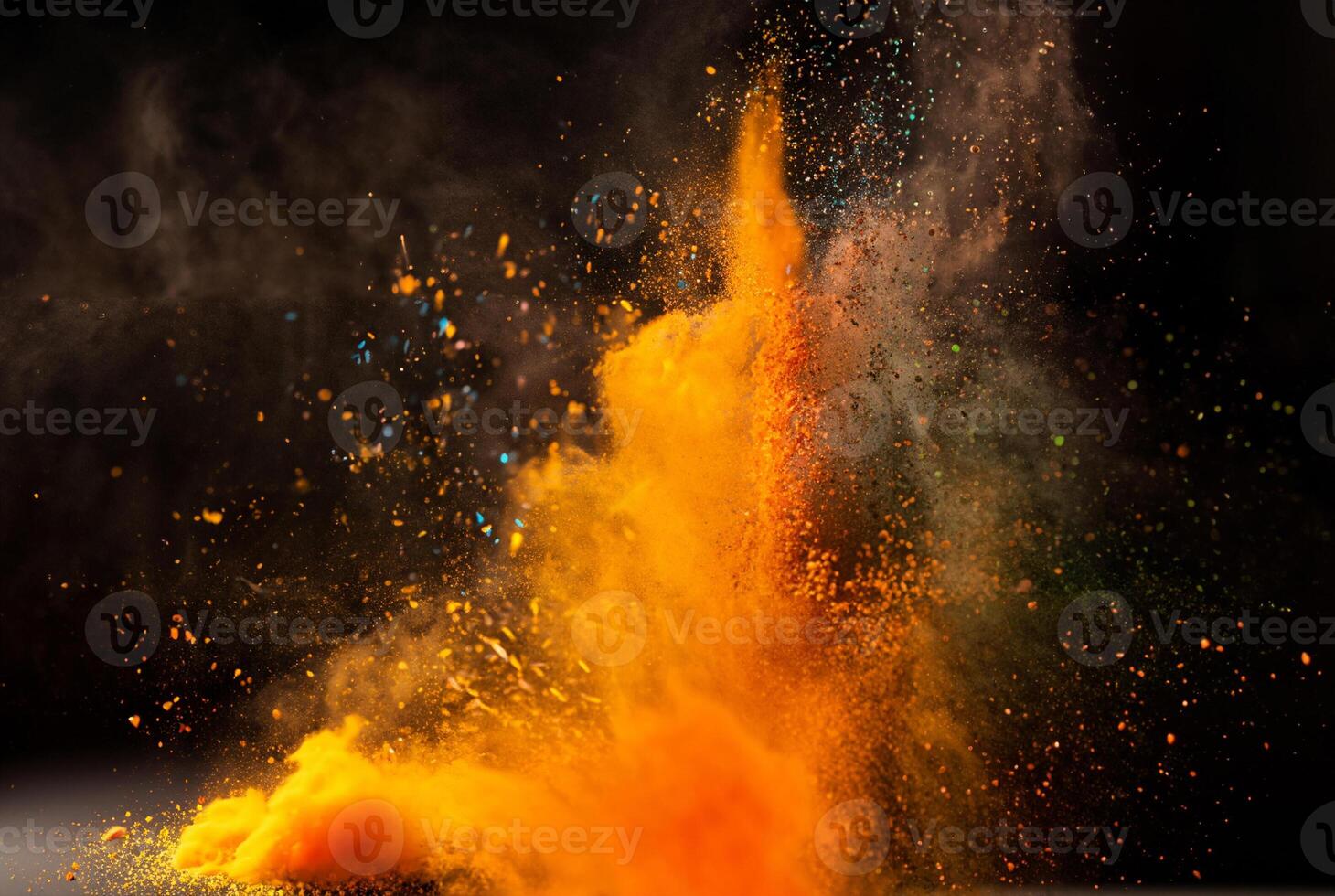 Vibrant orange powder explosion with dynamic motion against a dark backdrop. photo