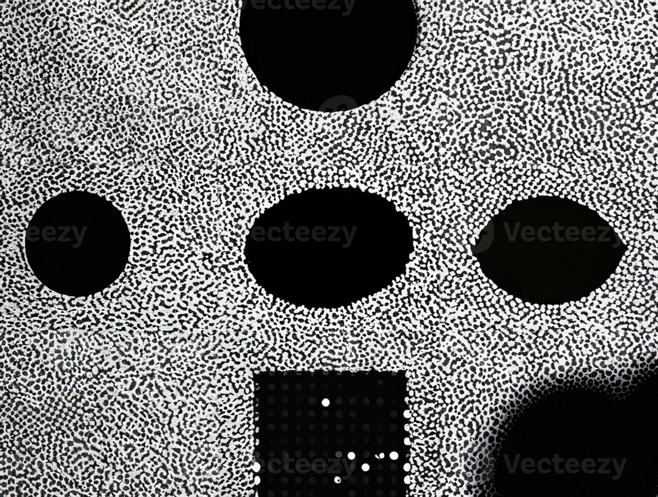 Abstract black and white dotted texture forming a random yet organized pattern with intricate details. photo