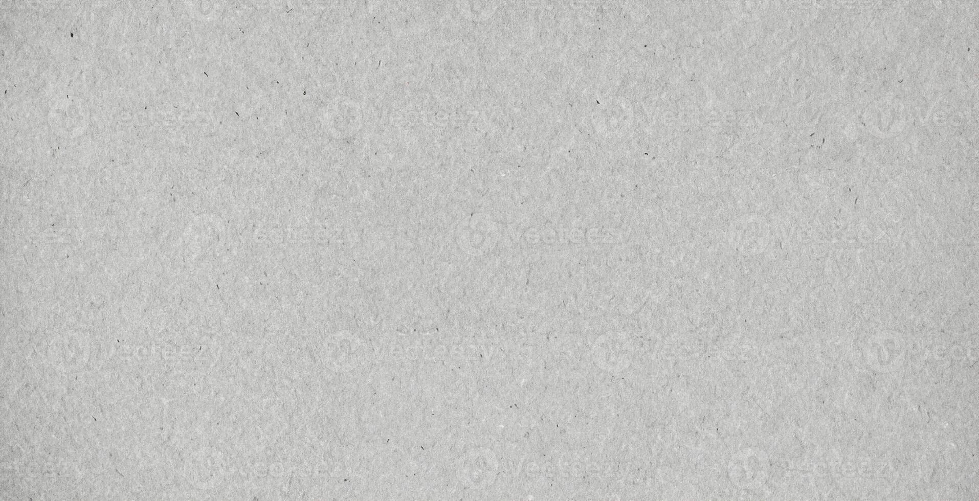 Light gray recycled paper texture, ideal for backgrounds in design, packaging, and eco-friendly projects. photo