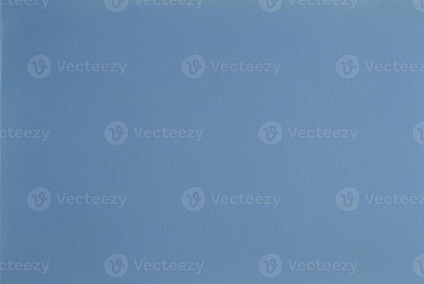Seamless light blue paper texture background with a smooth, minimalist surface, ideal for designs. photo