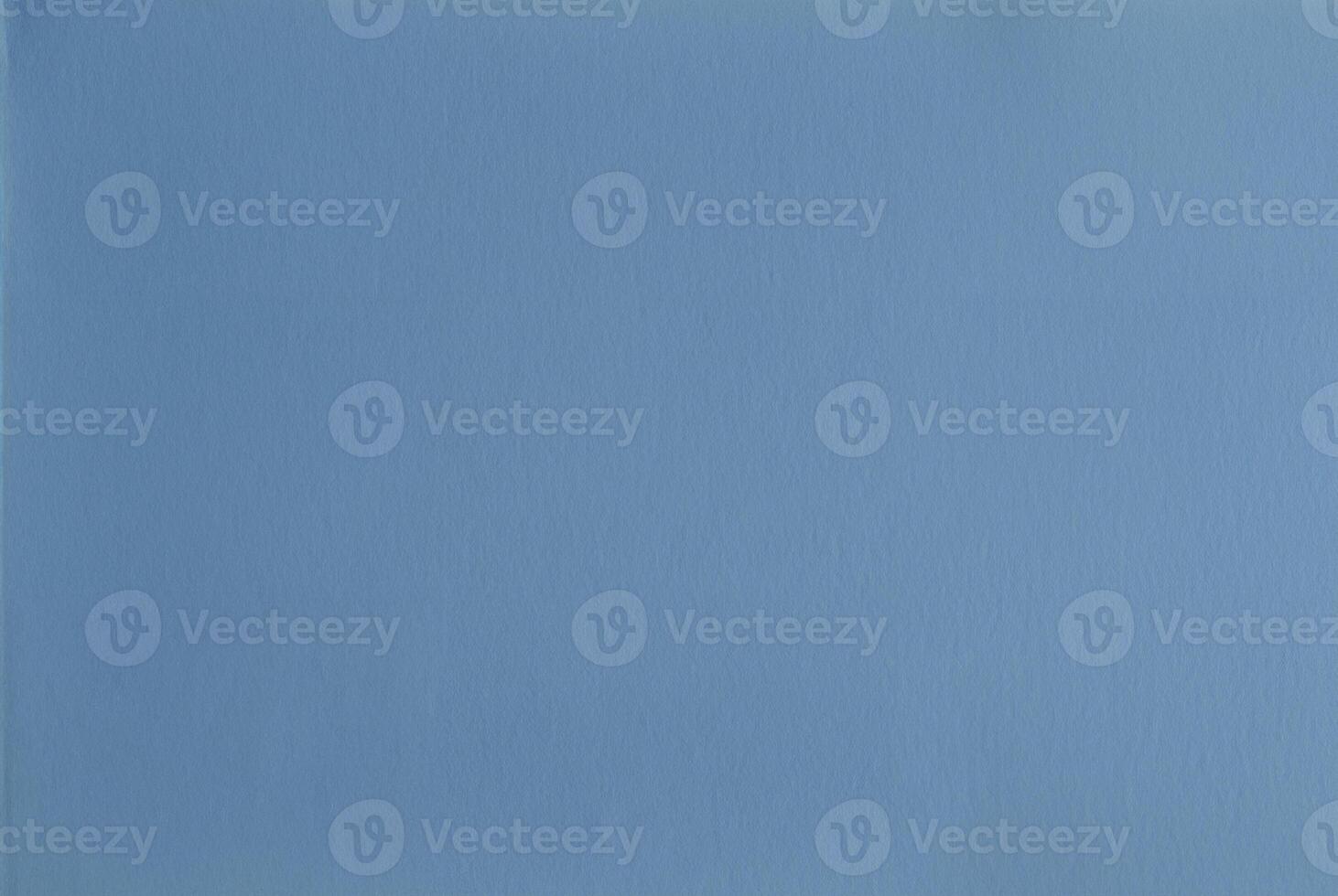 Seamless light blue paper texture background with a smooth, minimalist surface, ideal for designs. photo