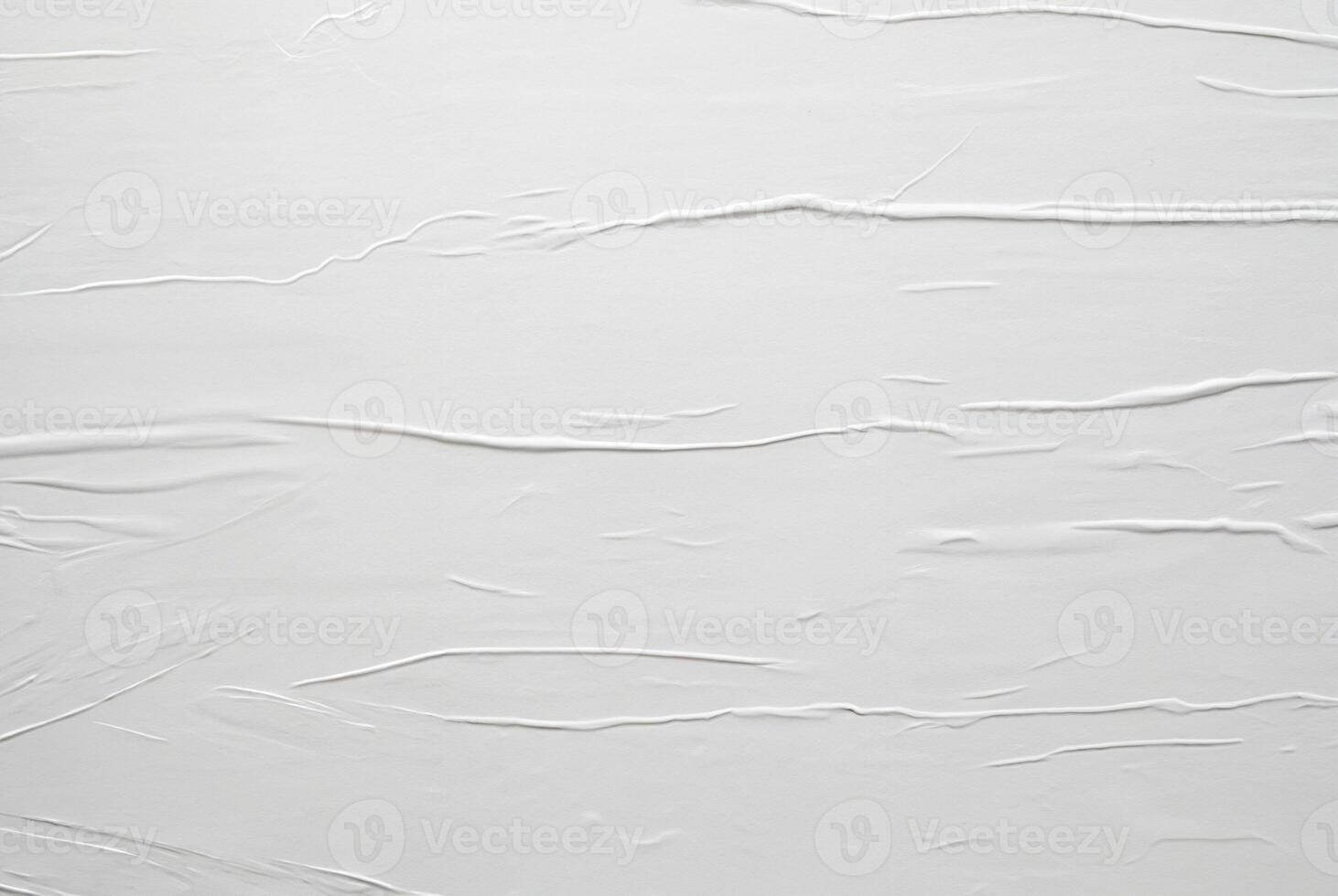 Minimalist white textured surface with soft horizontal lines and creases, ideal for abstract backgrounds, design, or texture use. photo