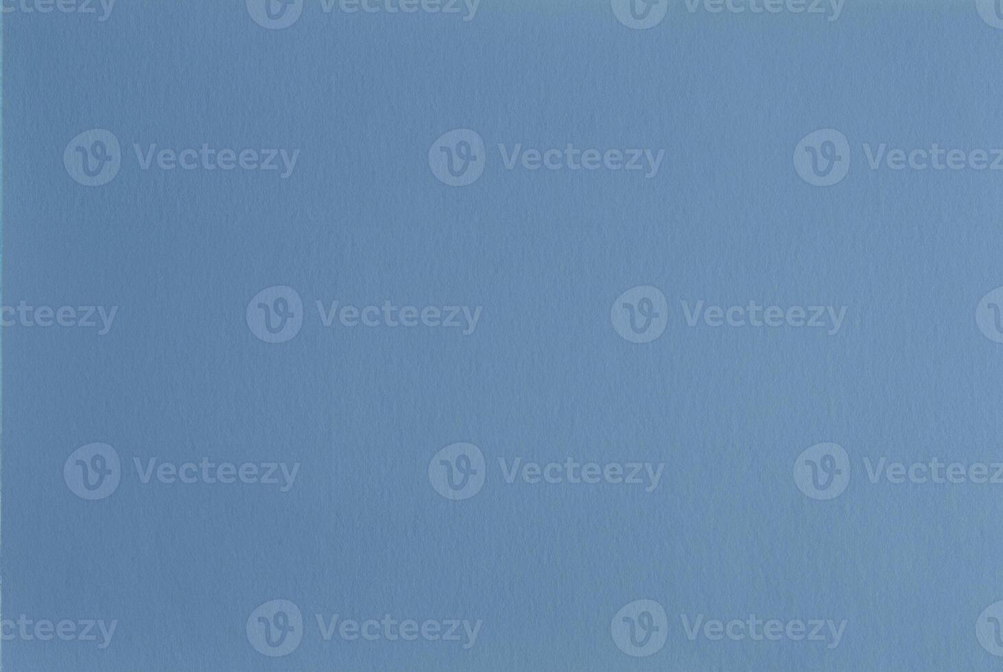 Seamless light blue paper texture background with a smooth, minimalist surface, ideal for designs. photo