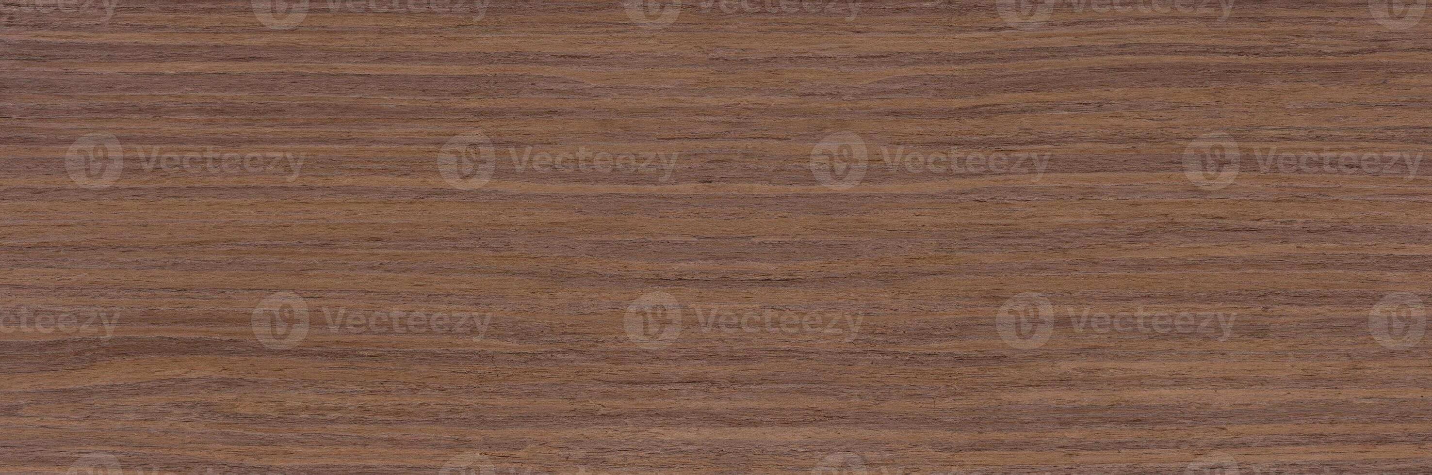 Close-up of natural wood grain texture in a brown color, ideal for backgrounds or design elements. photo