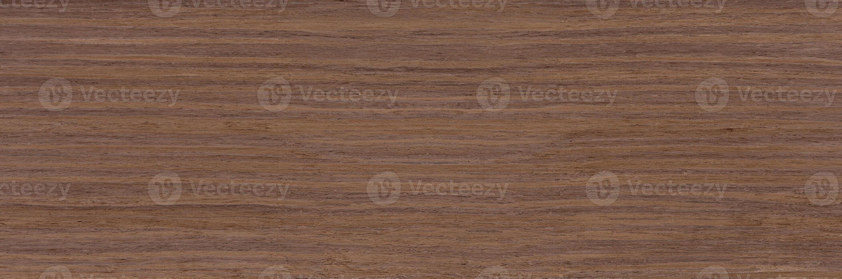 Close-up of natural wood grain texture in a brown color, ideal for backgrounds or design elements. photo