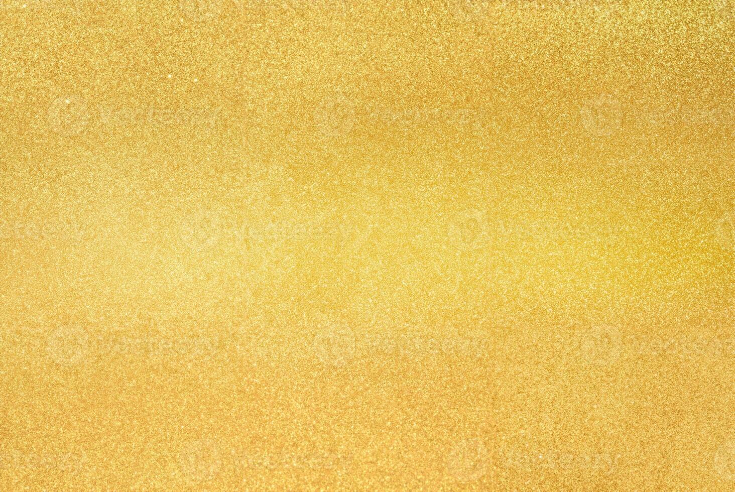 Close-up of gold glitter texture with a shimmering surface, perfect for festive backgrounds, design, and luxury themes photo