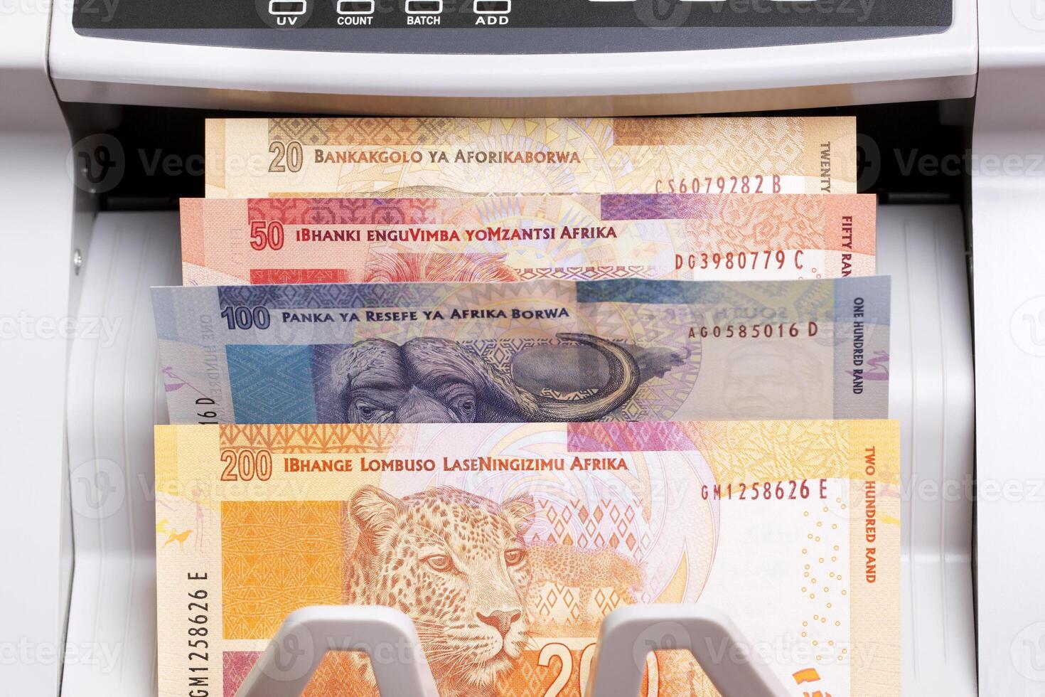 South African money in the counting machine photo