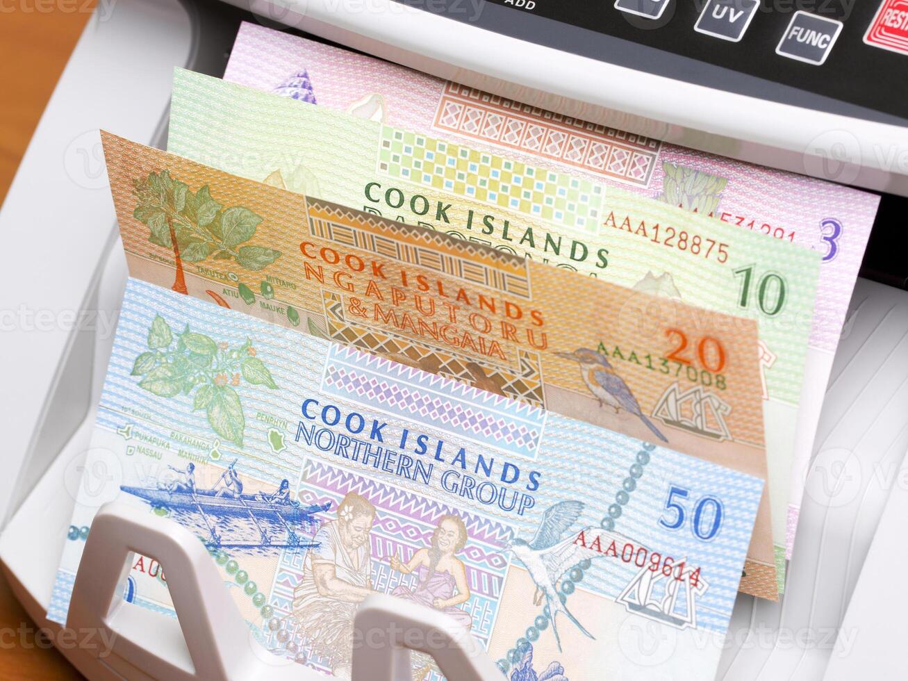 Cook Islands dollar in the counting machine photo