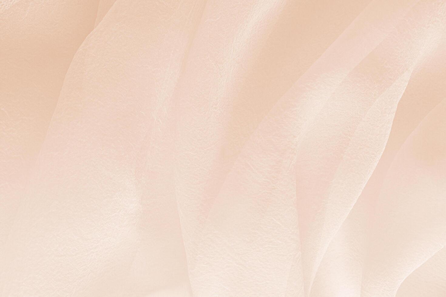Elegant fabric background for design. Soft delicate chiffon folds of pastel-colored fabric. wedding background. Drapery of silk transparent fabric photo