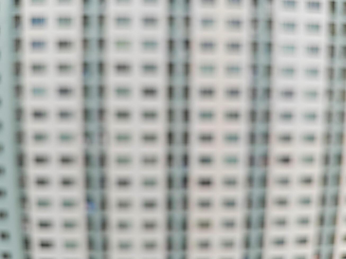 Blurred view of balcony and windows of apartment building. photo