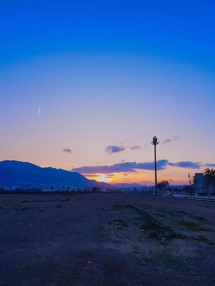 Sun decreases under the horizon photo