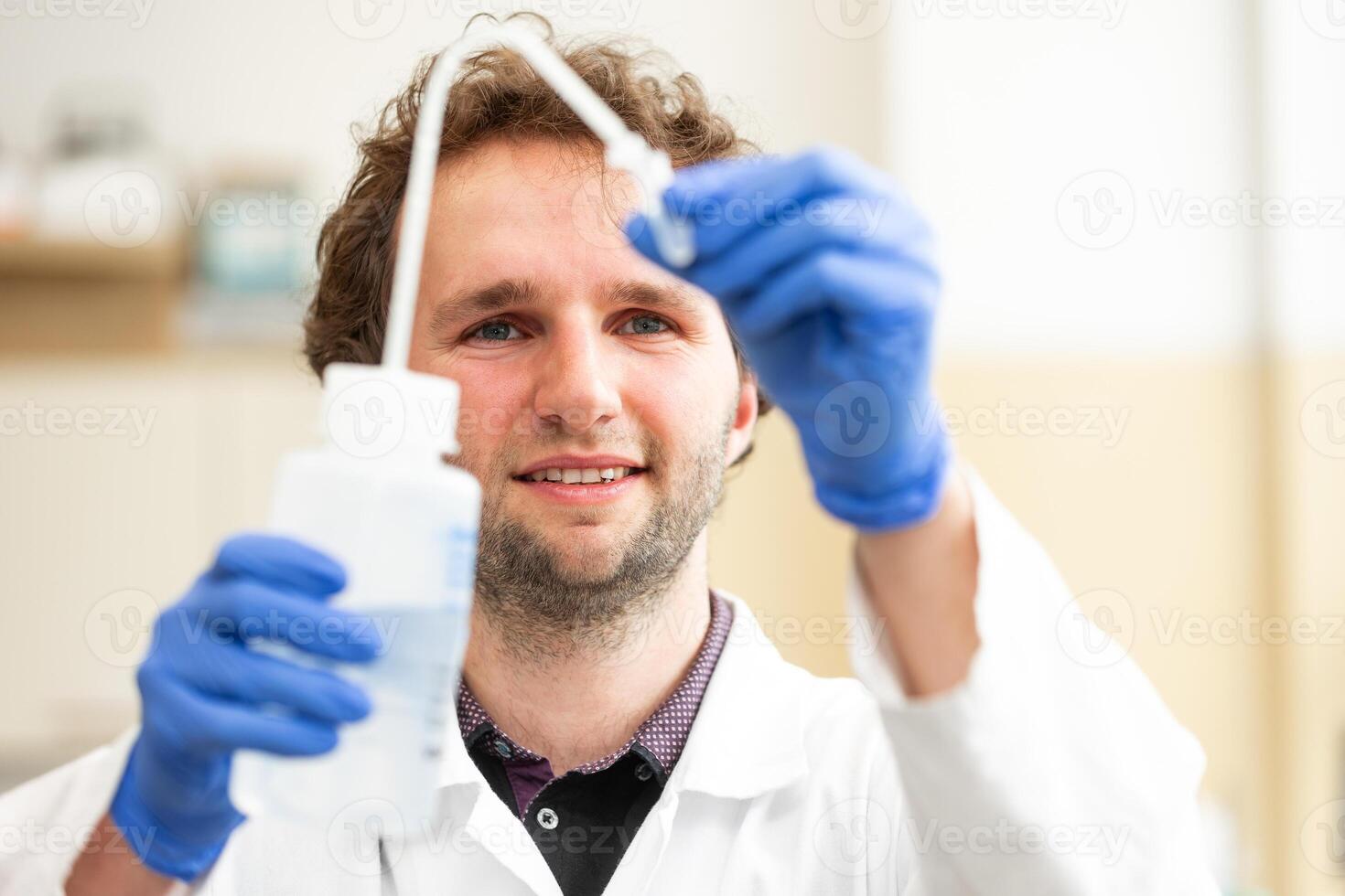 Chemistry lab concept, scientist conduct experiments in a chemist laboratory photo