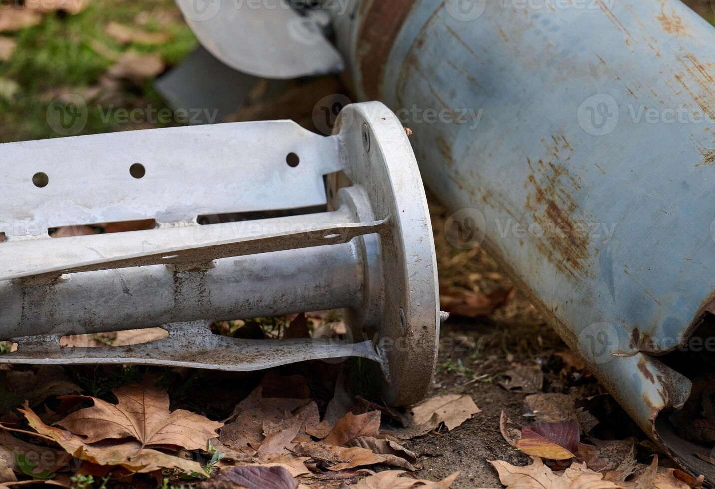 The tail section of a 220 mm rocket for the Uragan rocket fire system on a city flowerbed in Mykolaiv photo