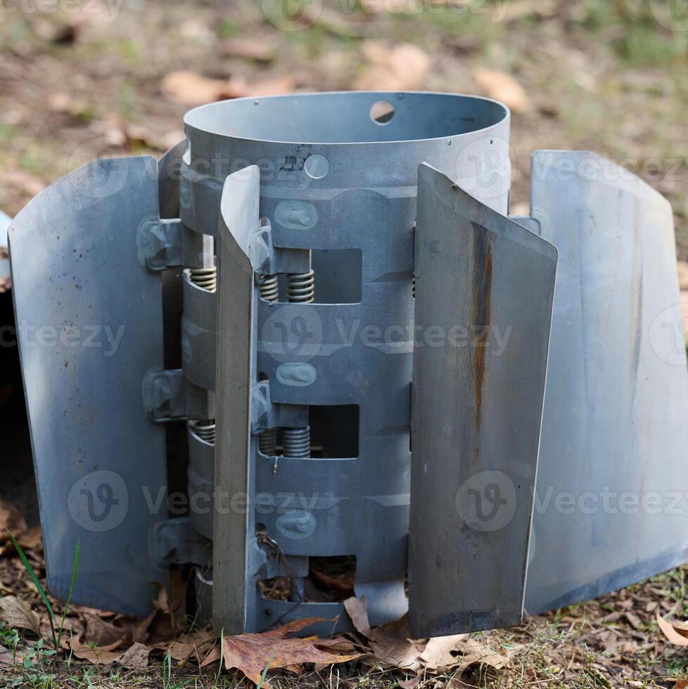 The tail section of a 220 mm rocket for the Uragan rocket fire system on a city flowerbed in Mykolaiv photo