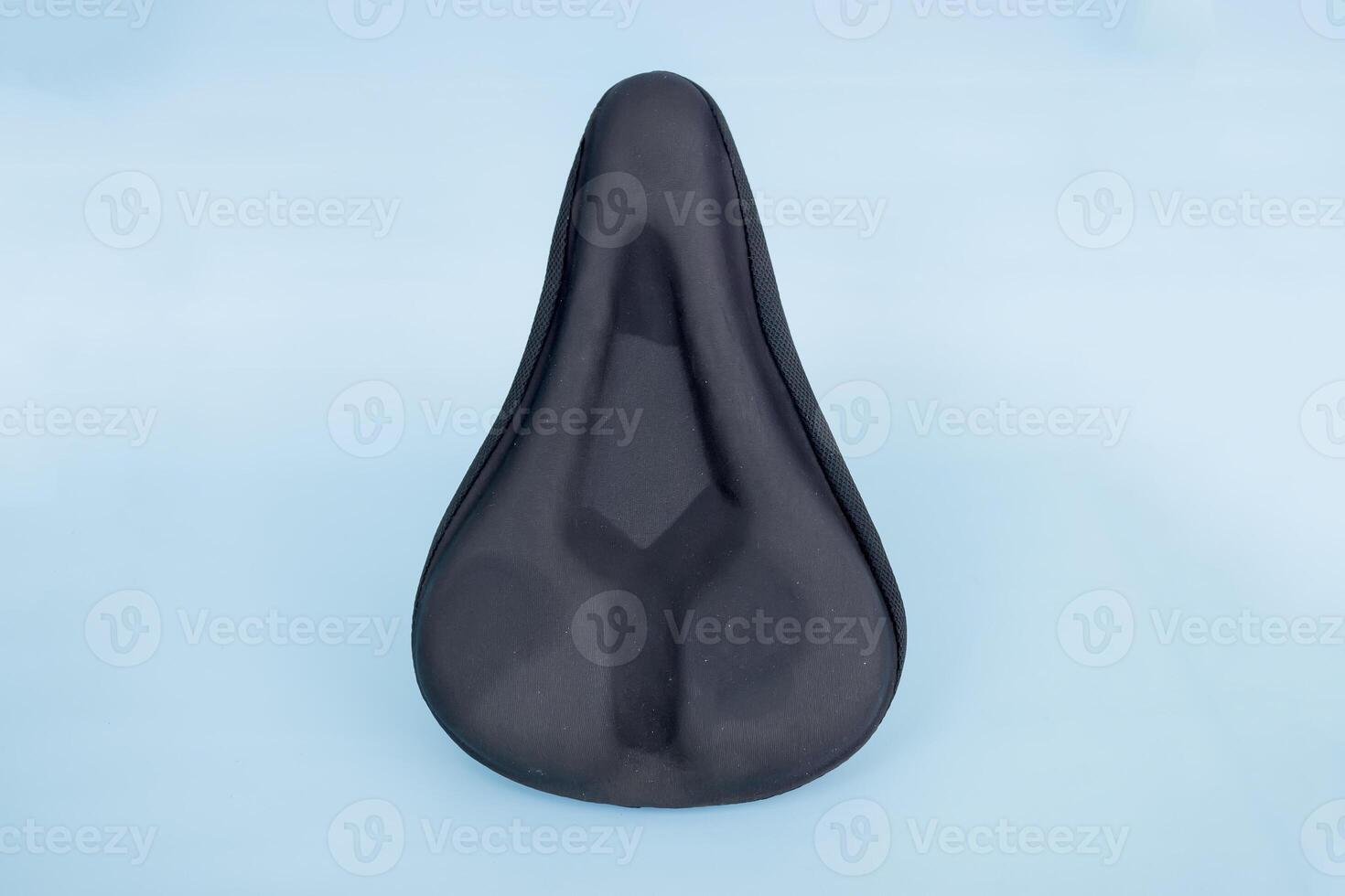 bicycle saddle cover, part of a bicycle, isolated on blue background photo