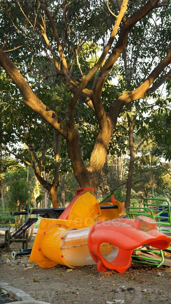 children's play areas that are not maintained and there is no warning tape. photo