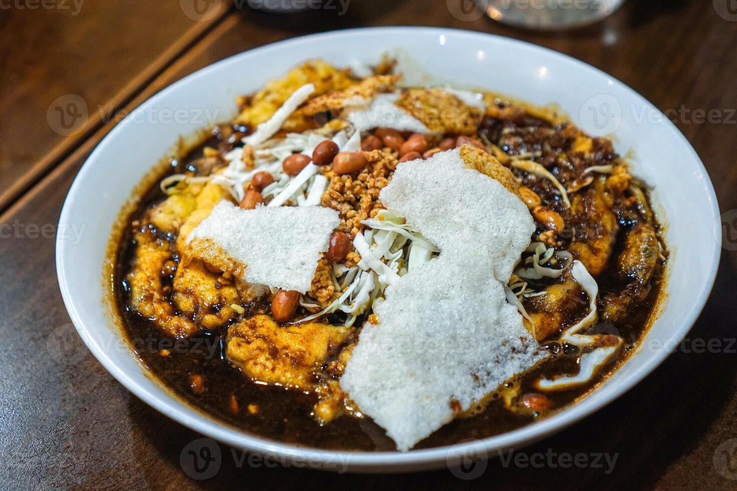 Tepo Tahu is a traditional food consisting of the basic ingredients of tofu, eggs and rice cake photo