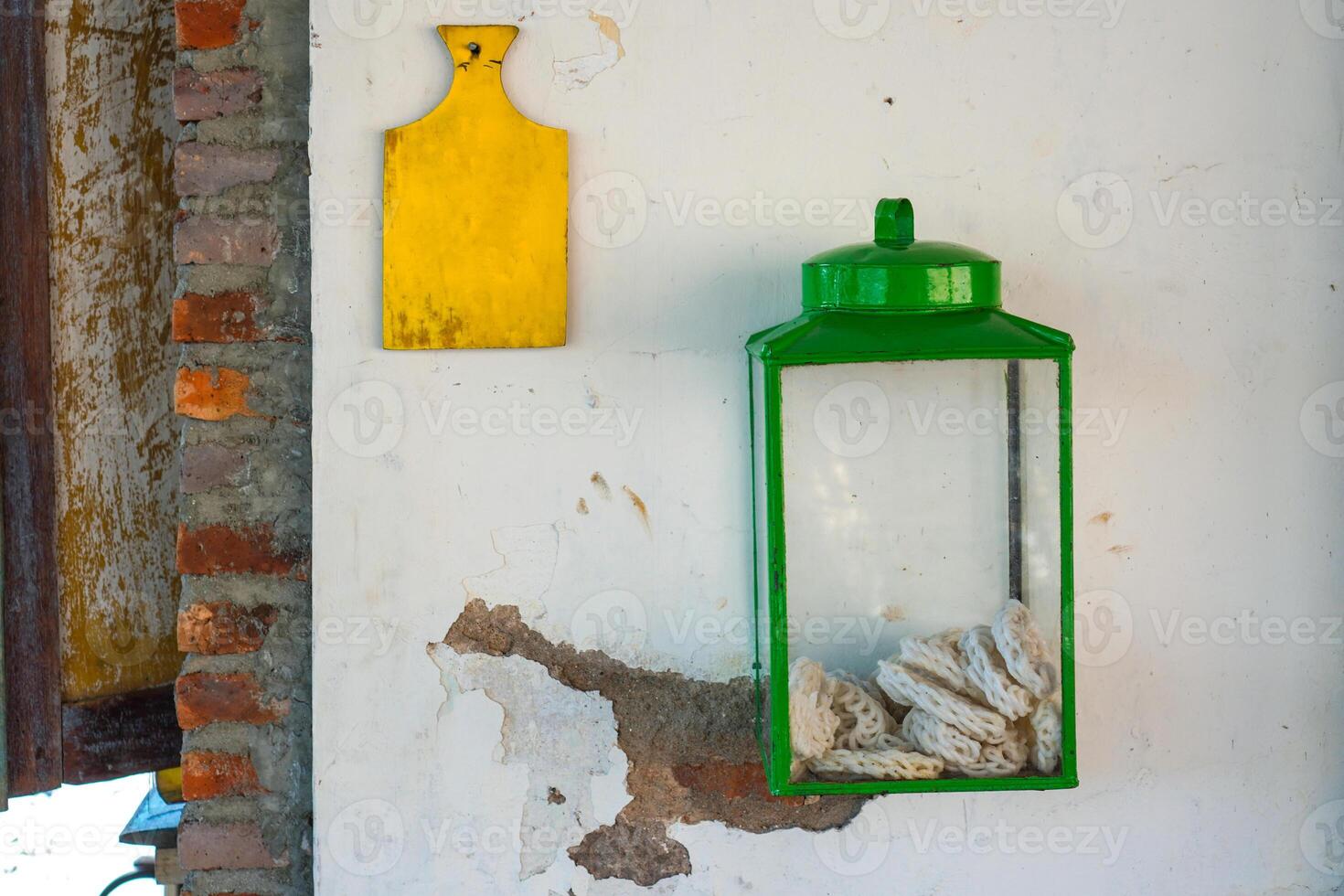 Unique and creative, wall displays in the form of cracker tins and wooden cutting boards photo
