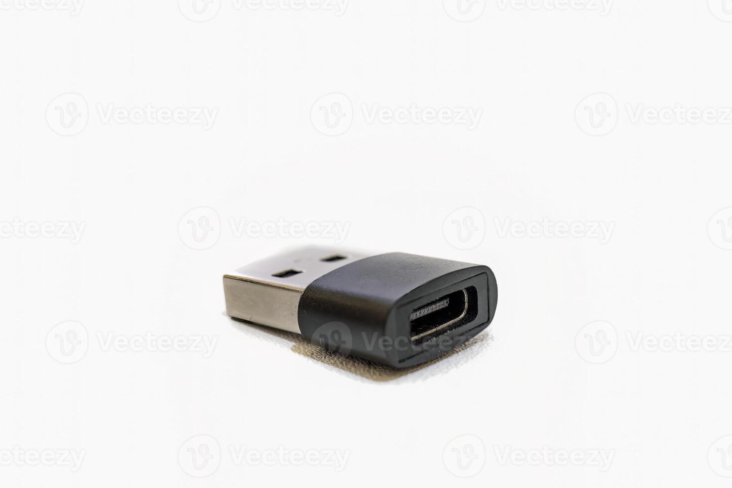 Macro shot of the USB type-C to USB type-A adapter, isolated on a white background photo