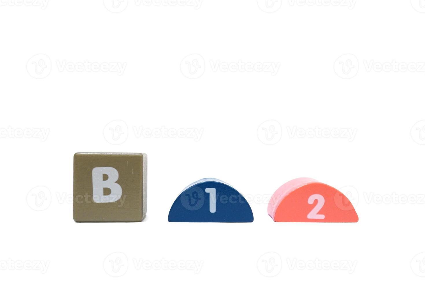 The word B12 is made with colorful building blocks isolated on a white background. photo