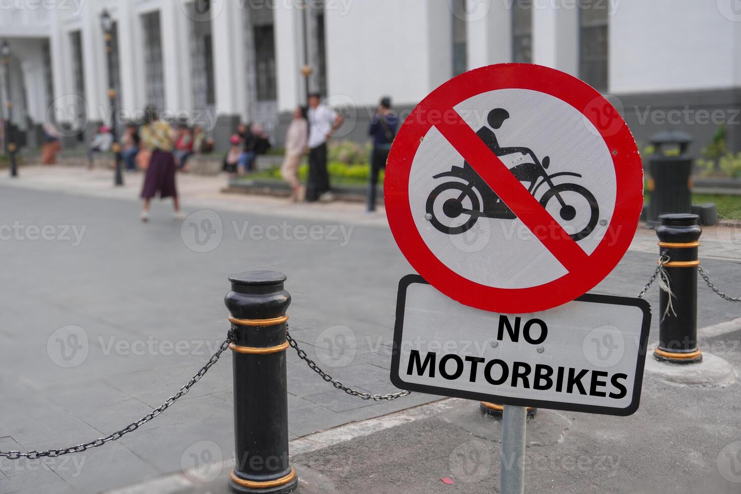 Motorbike prohibition sign with the words no motorbikes photo