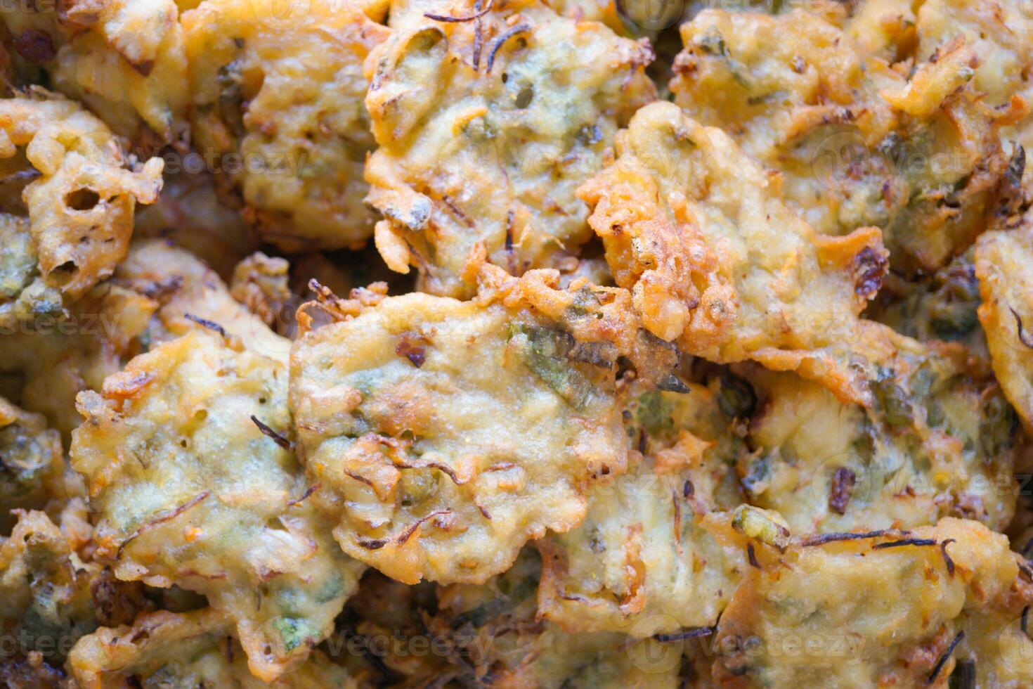 Bakwan is a fried food made from vegetables and wheat flour. photo